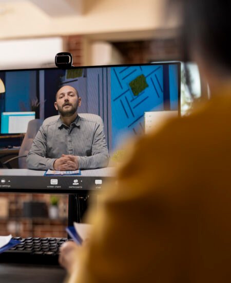 Businessman leading a virtual meeting