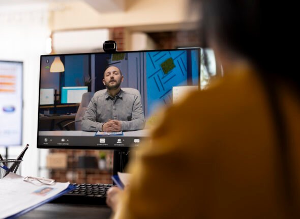 Businessman leading a virtual meeting
