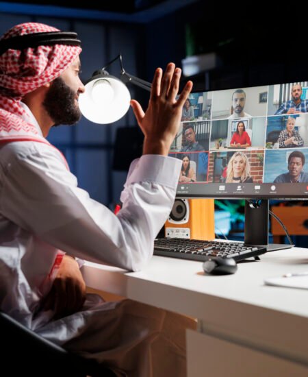 Muslim guy conducting an online meeting