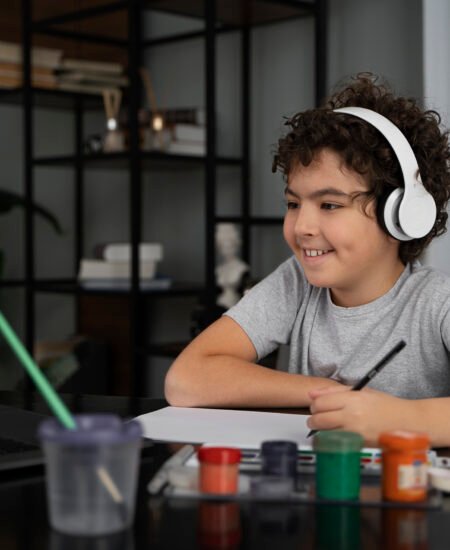 young-kid-painting-with-watercolor